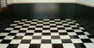 This image shows a garage floor with epoxy paint.